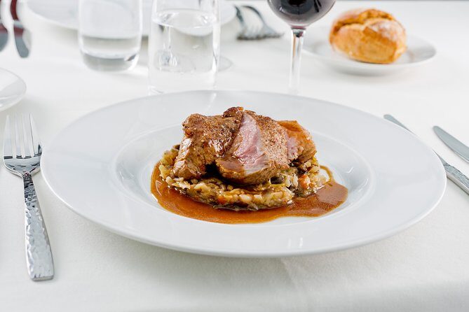 Bateaux Parisiens Seine River Gourmet Dinner & Sightseeing Cruise - Live singer, table service, and the overall mood