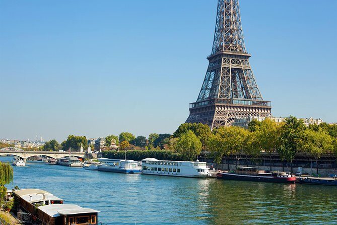 Eiffel Tower Tour by Lift and Seine Cruise - Eiffel Tower tour: elevator access and guided history