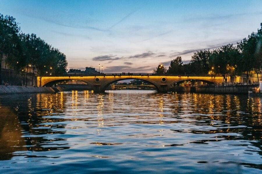 Paris : 3-Course Gourmet Dinner Cruise on Seine River - The onboard vibe: service, singing, and pacing that feels relaxed