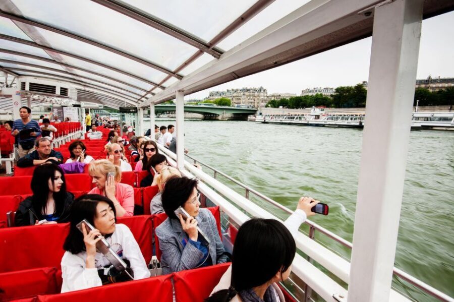 Paris: Audio-Guided Bus Tour & Seine River Cruise - Weather reality check: closed comfort helps, but sound matters too