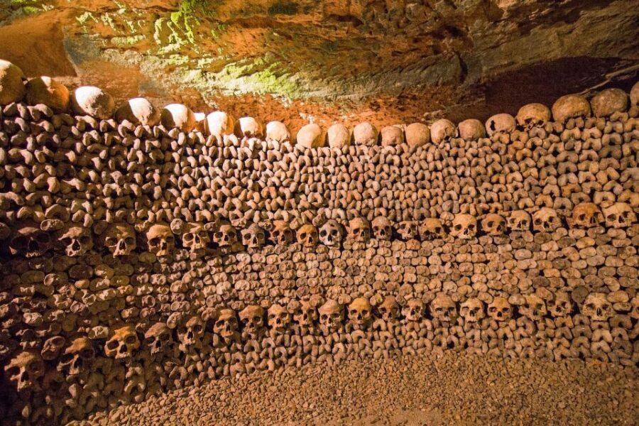 Paris: Catacombs Entry & Seine River Cruise with Audio Guide - Walking the underground maze with audio you control