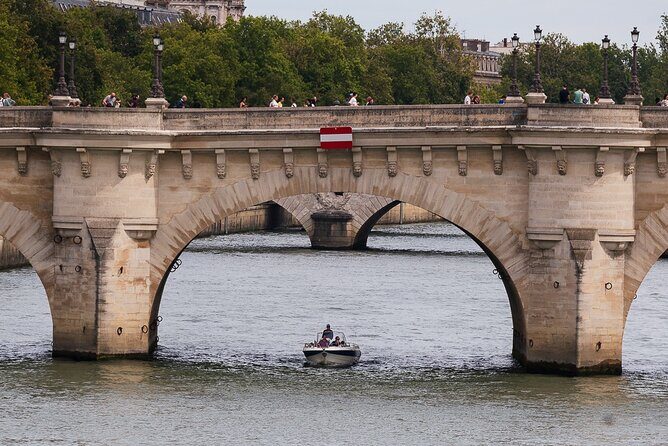 Paris Private Seine River Cruise with your Captain Guide - Orsay station turned museum, then the Louvre: art power from the water