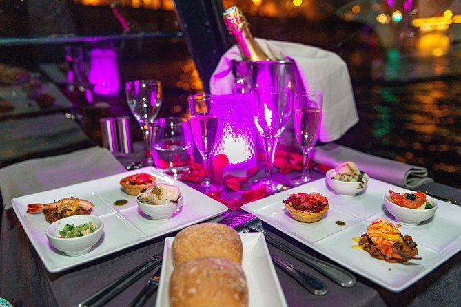 Paris Seine River Dinner Cruise with Champagne and Window Seating - Boarding and timing: early or late for your best views