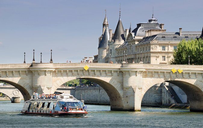 Paris Tour with Lunch at the Eiffel Tower and Seine River Cruise - Seine River cruise with 14-language audio: enjoying the ride, not fighting for it