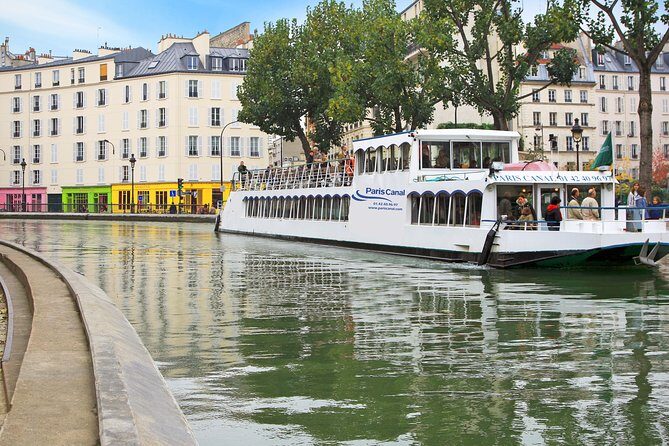 Seine River Cruise and Paris Canals Tour - Sound, seating, and weather: getting the most from 2 hours 30 minutes